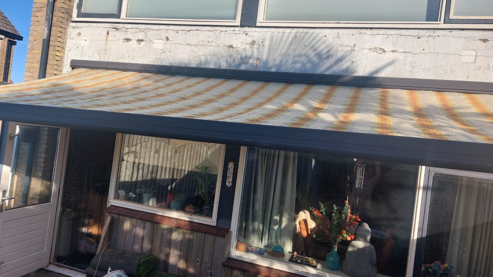 Gebruikt knikarmscherm, breedte 5 meter