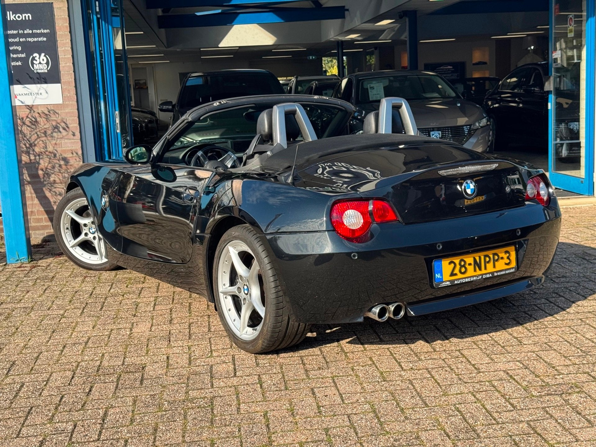 Foto 3 van BMW Z4 Roadster 3.0i 2003 ZWART CABRIO AIRCO LM APK NAP!