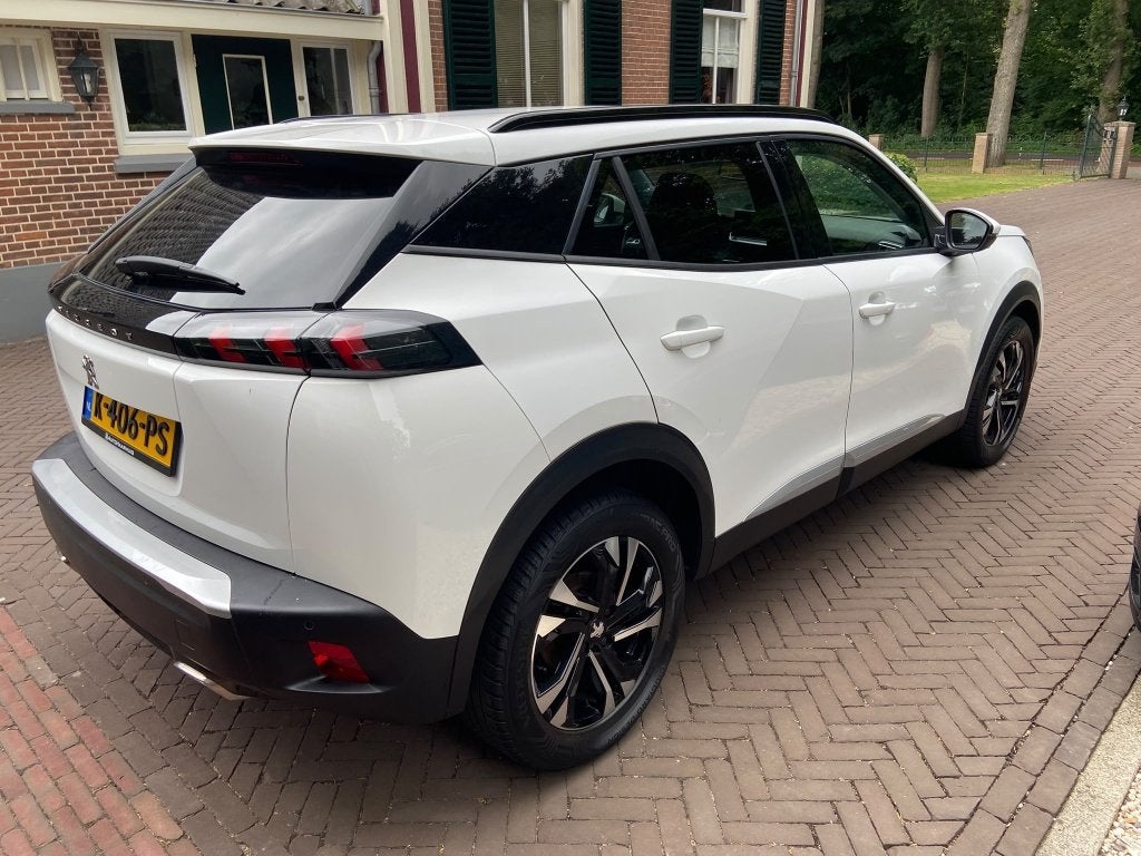 Peugeot 2008 1.2 130pk Allure Navi, Camera, CarPlay, 1e Eige, Auto's, Gebruikt, 1199 cc, Met garantie (alle), Leder en Stof