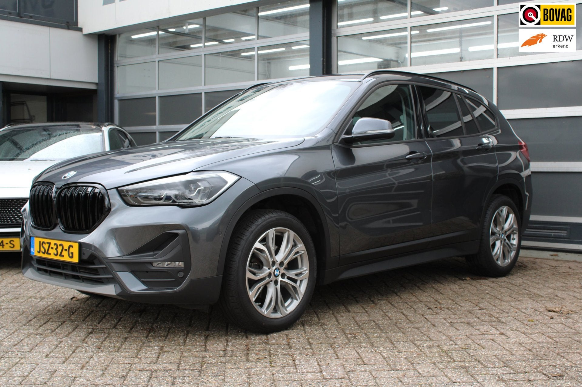 BMW X1 SDrive18i/Leer/Automaat, Gebruikt, Zwart, Leder, Bedrijf