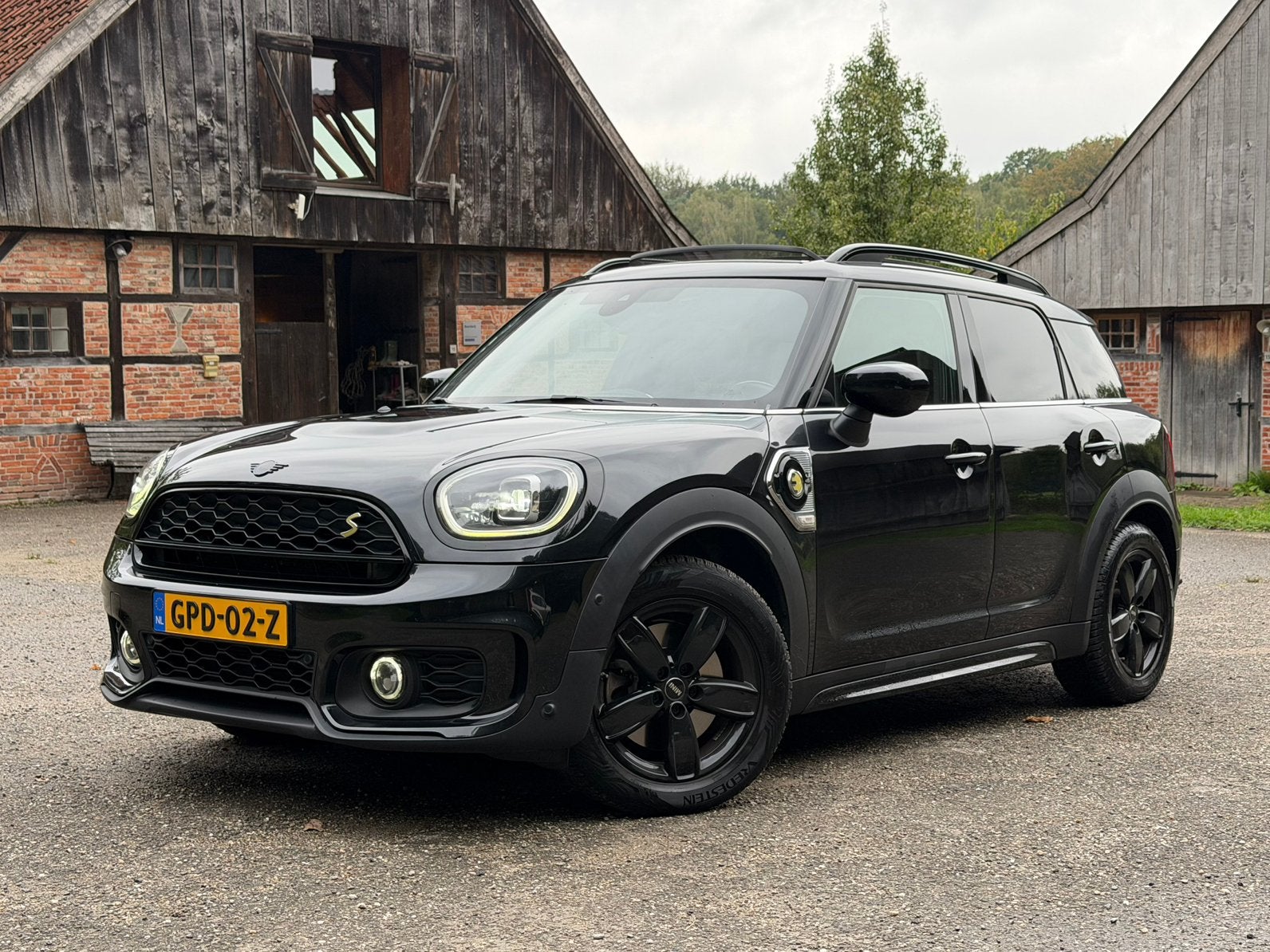 Mini Countryman 1.5 Cooper S E ALL4 John Cooper Works Pano, Auto's, Automaat, 125 pk, Zwart, Leder