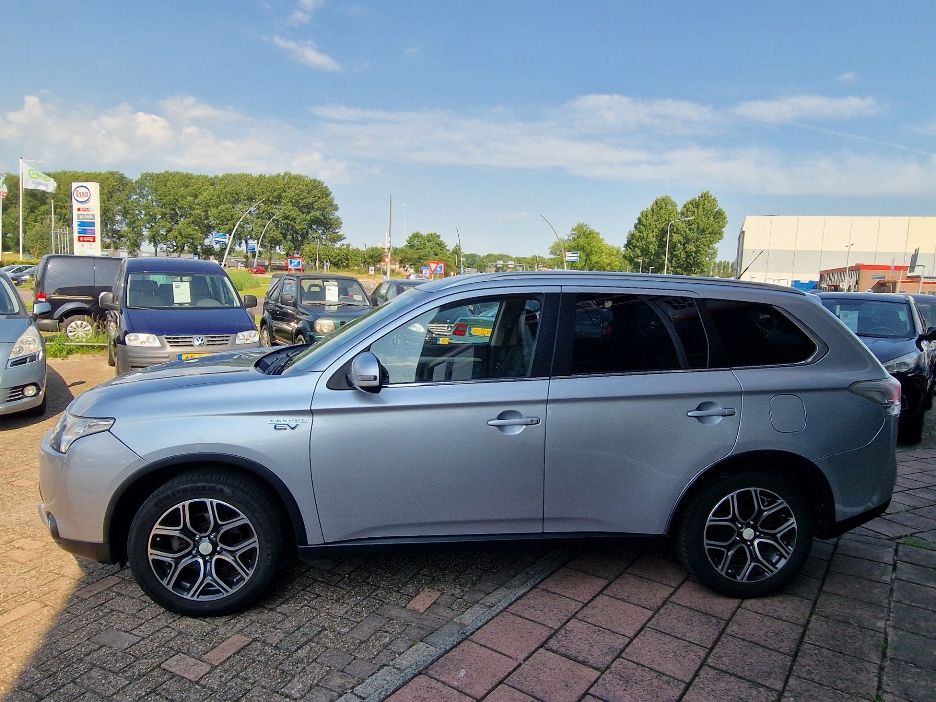 Mitsubishi Outlander 2.0 PHEV Executive Edition - Apk t/m 16, Auto's, Mitsubishi, Zwart, 4 cilinders, Leder en Stof, Automatische klimaatregeling