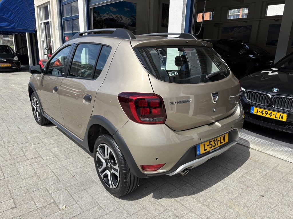 Dacia Sandero 0.9 TCe SL Stepway AIRCO/NAVI/BLUETOOTH/CRUISE, Auto's, Dacia, Voorwielaandrijving, 898 cc, Euro 6, Bruin