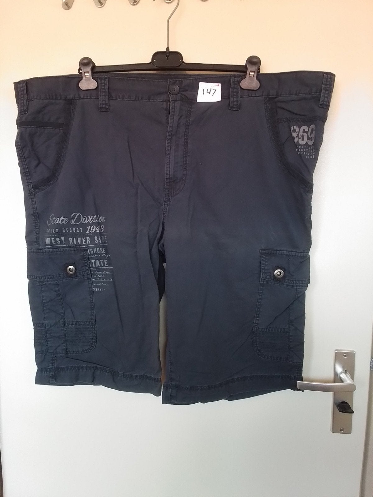147 Blauwe korte broek van C&A maat 62, Kleding | Heren, Ophalen of Verzenden, Zo goed als nieuw, Overige maten, Blauw