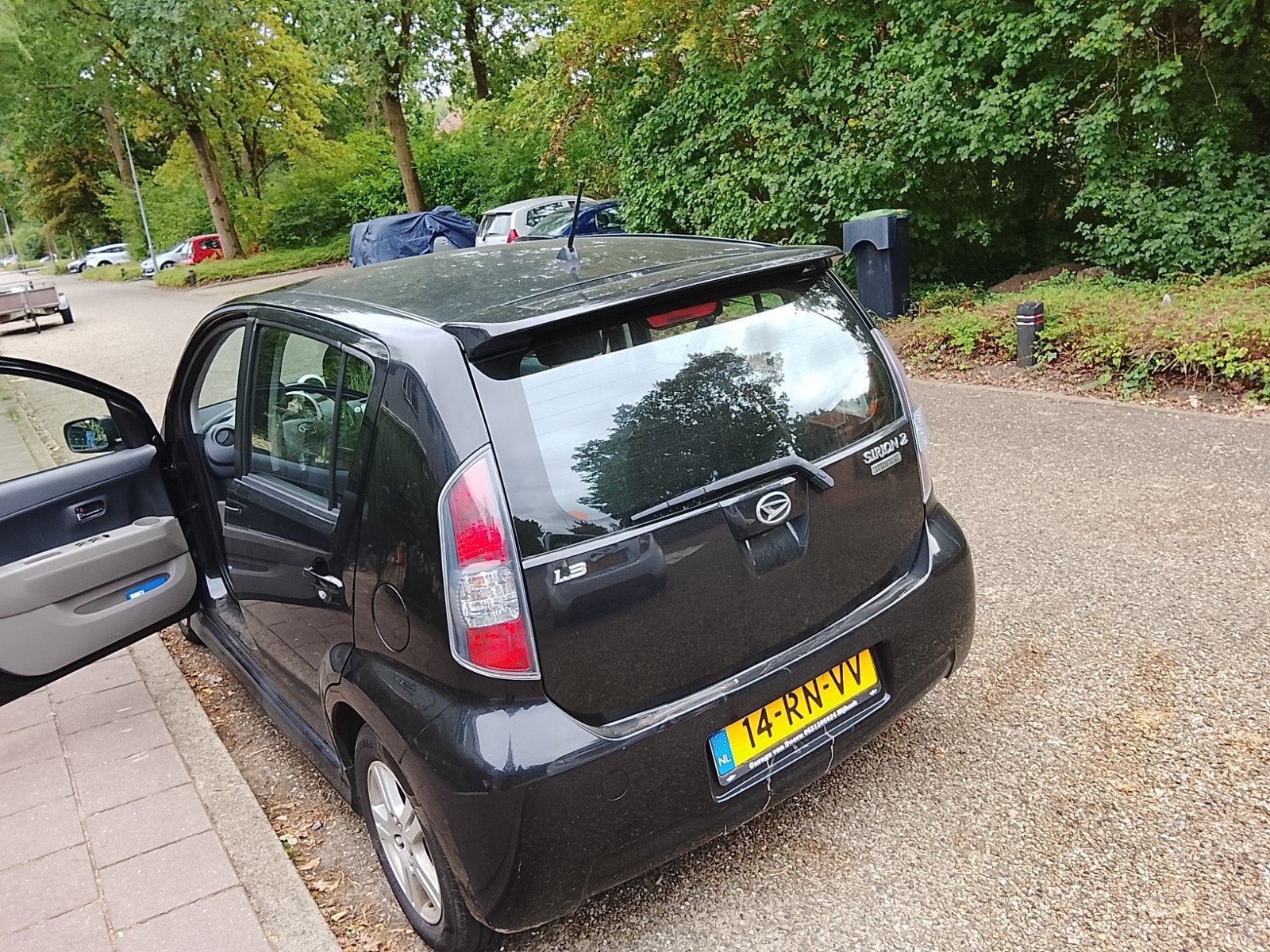 Daihatsu Sirion 1.3 2005 Zwart, Auto's, Voorwielaandrijving, 40 €/maand, 4 cilinders, Zwart