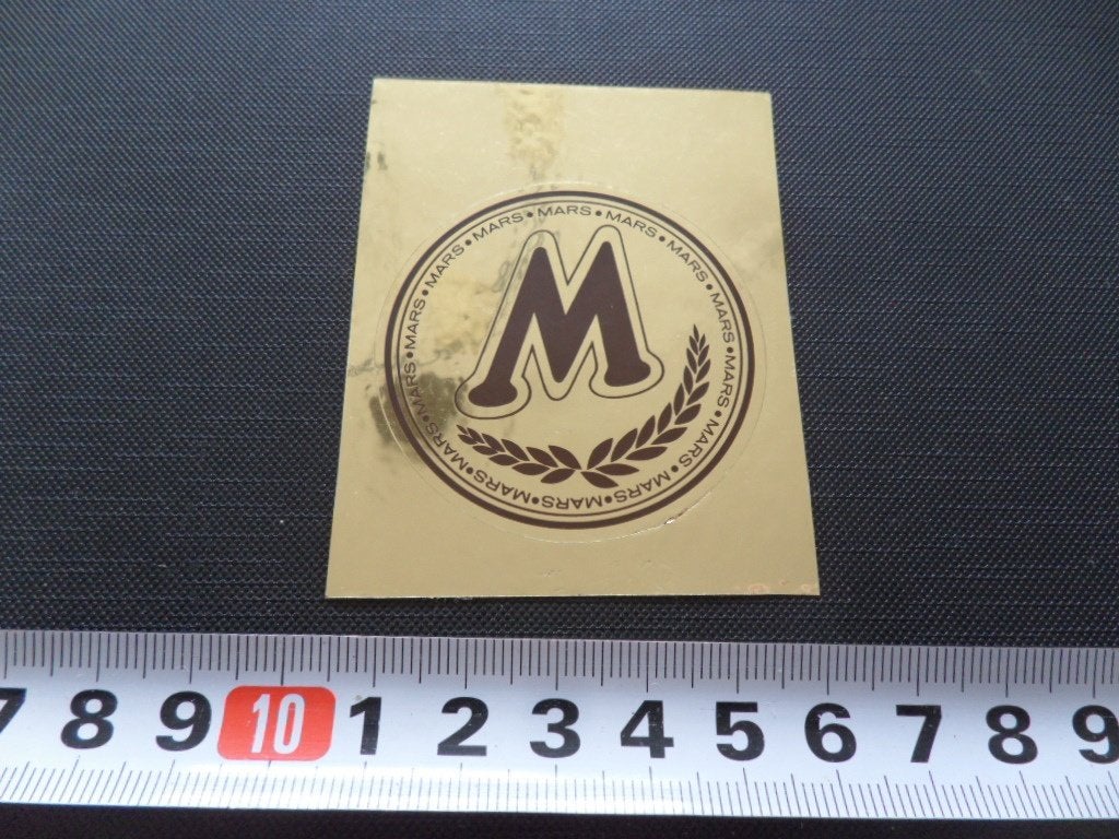 sticker folie logo M mars, Ophalen, Zo goed als nieuw