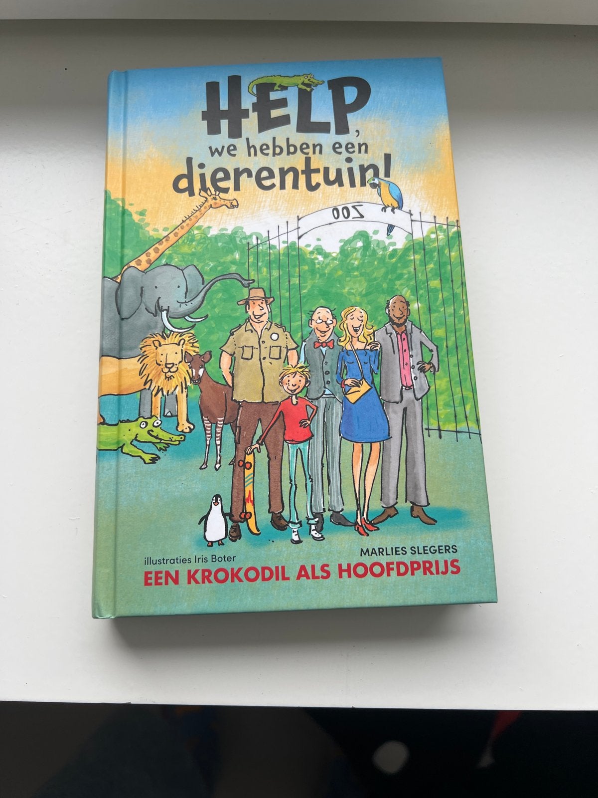 Help, we hebben een dierentuin! - Marlies Slegers, Boeken, Ophalen, Zo goed als nieuw, Fictie algemeen