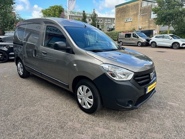 Dacia Dokker 1.6 MPI 100 Basic (bj 2016), Auto's, Stof, Gebruikt, Euro 6, Handgeschakeld