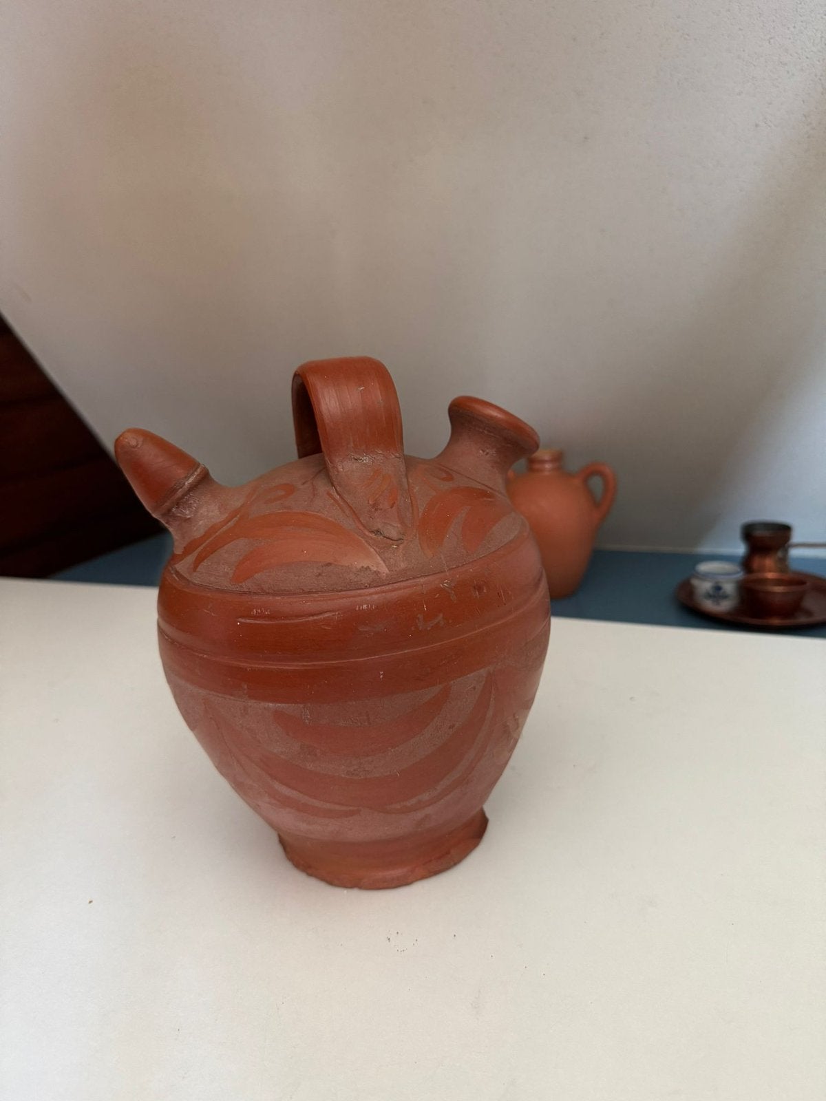 Waterkruik steenrood aardewerk, Ophalen