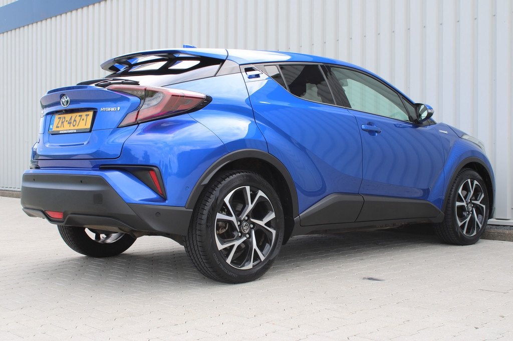 Toyota C-HR 1.8 Hybrid Style Ultimate | Incl. 12 maanden gar, Auto's, 12 maanden, Stof, 4 cilinders, Blauw