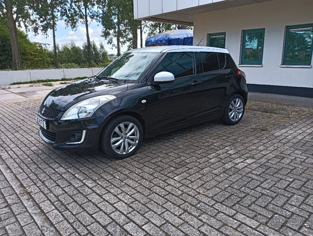 Suzuki Swift Special Edition. Cruise control. Navigatie ., Voorwielaandrijving, Stof, Euro 6, 4 cilinders