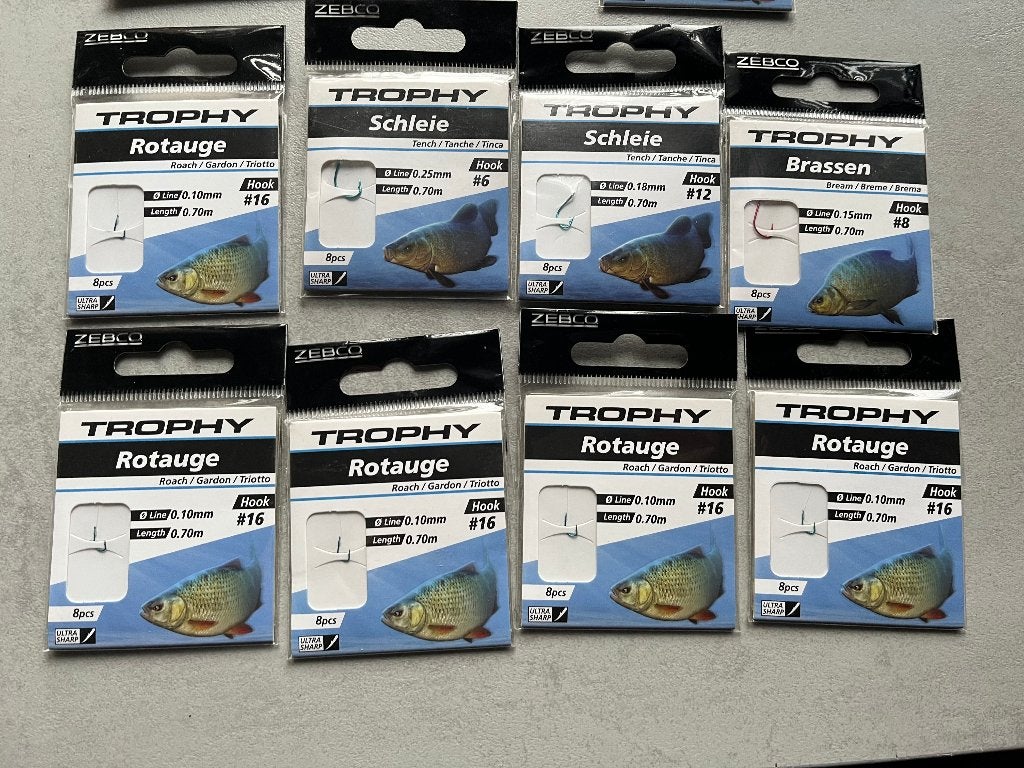 adv 68 / NIEUW mixset 11 onderlijnboekjes ZEBCO TROPHY, Ophalen of Verzenden, Nieuw, Haak