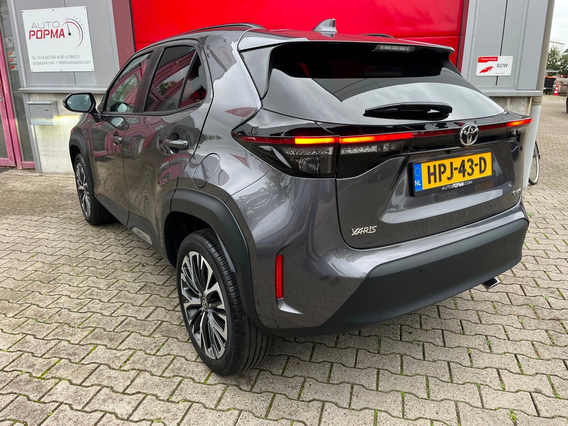 Toyota Yaris Cross 1.5 Hybrid 130 Executive Automaat / Adapt, Auto's, Dealer onderhouden, 1195 kg, Gebruikt, Leder en Stof
