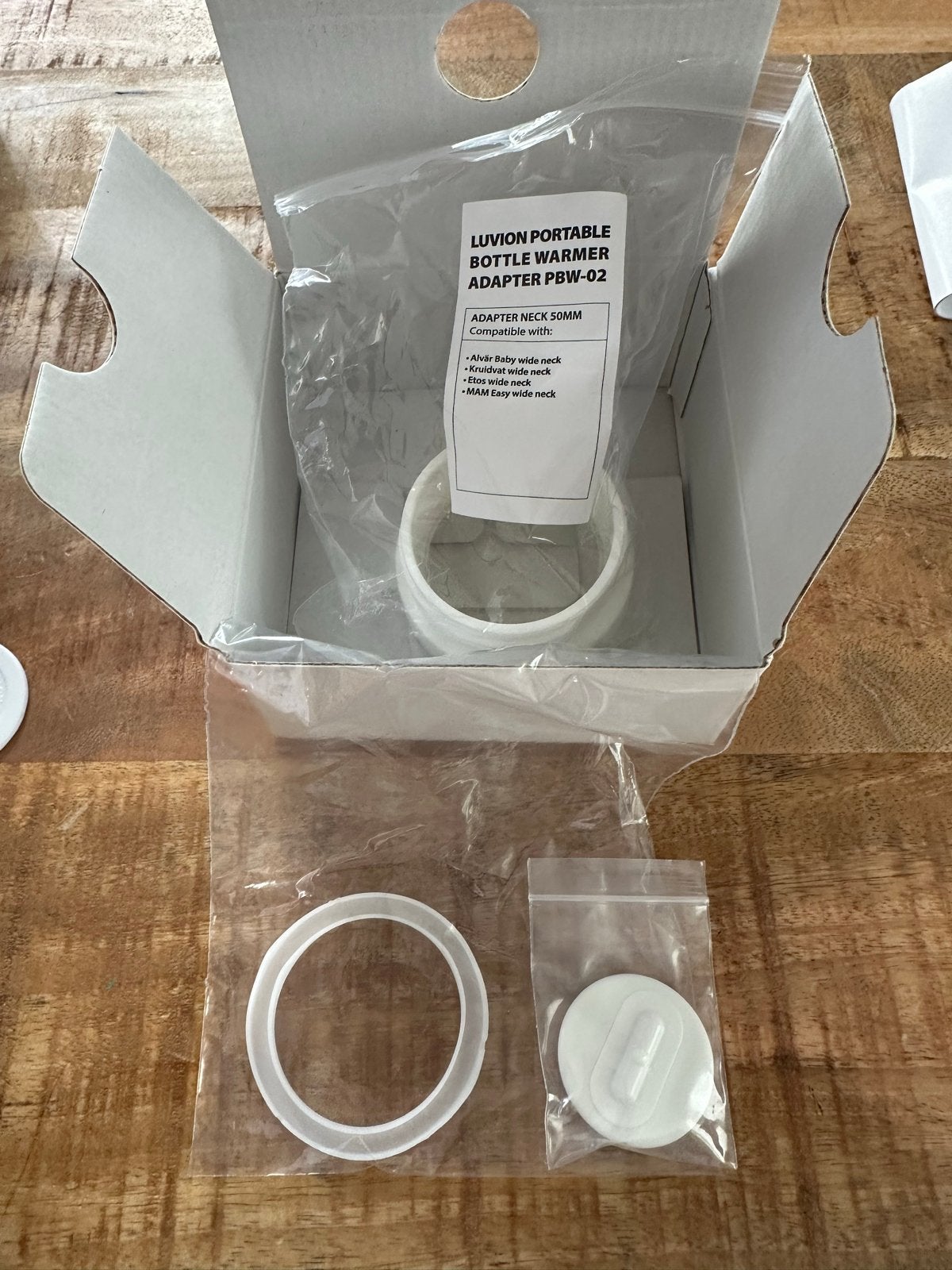 Luvion Ultra Pro Draagbare Flessenwarmer - Zo goed als nieuw, Ophalen, Flessen- of potjesverwarmer, Luvion, Zo goed als nieuw