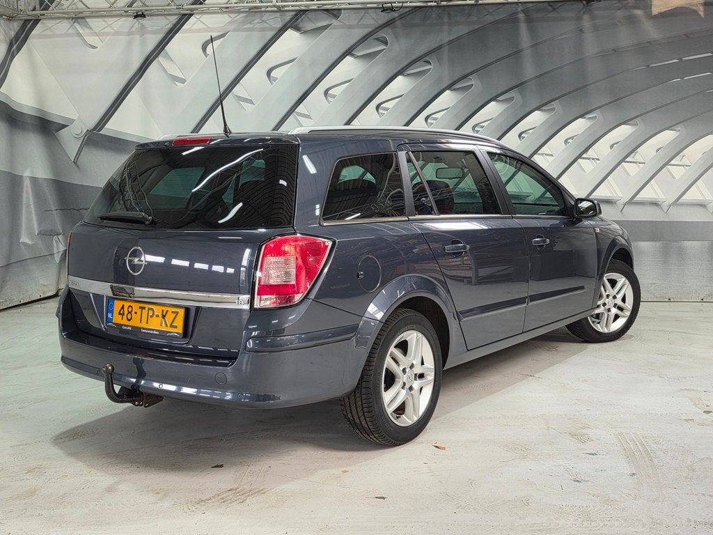 Opel Astra Wagon 1.8 Cosmo Automaat, Auto's, Opel, Stof, Gebruikt, Beige, 4 cilinders