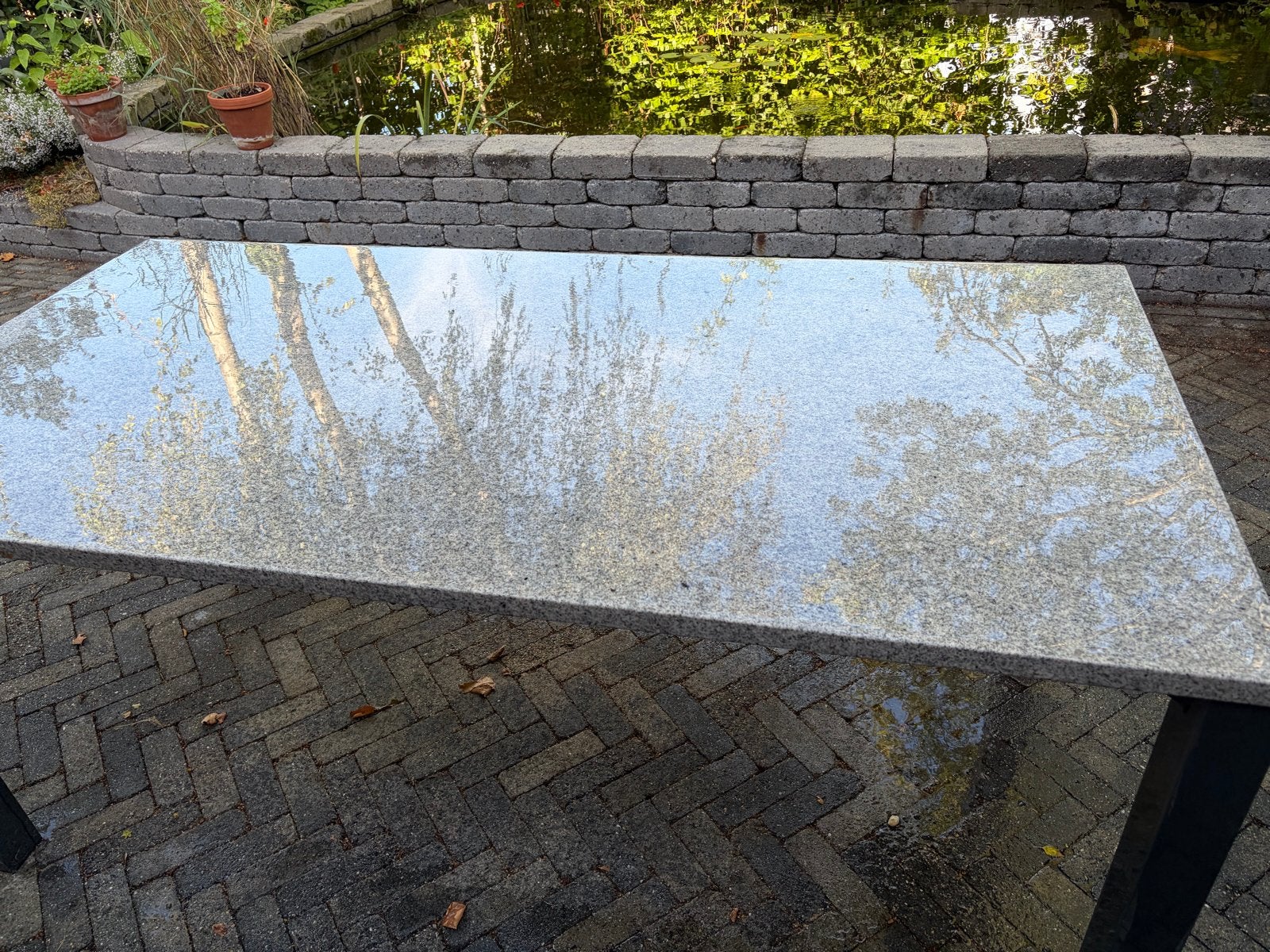 Granieten tafelblad met onderstel, Tuin en Terras, Ophalen of Verzenden, Gebruikt, Rechthoekig, Overige materialen