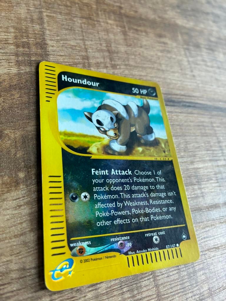 Houndour reverse holofoil Aquapolis Pokemonkaart, Ophalen of Verzenden, Zo goed als nieuw, Losse kaart