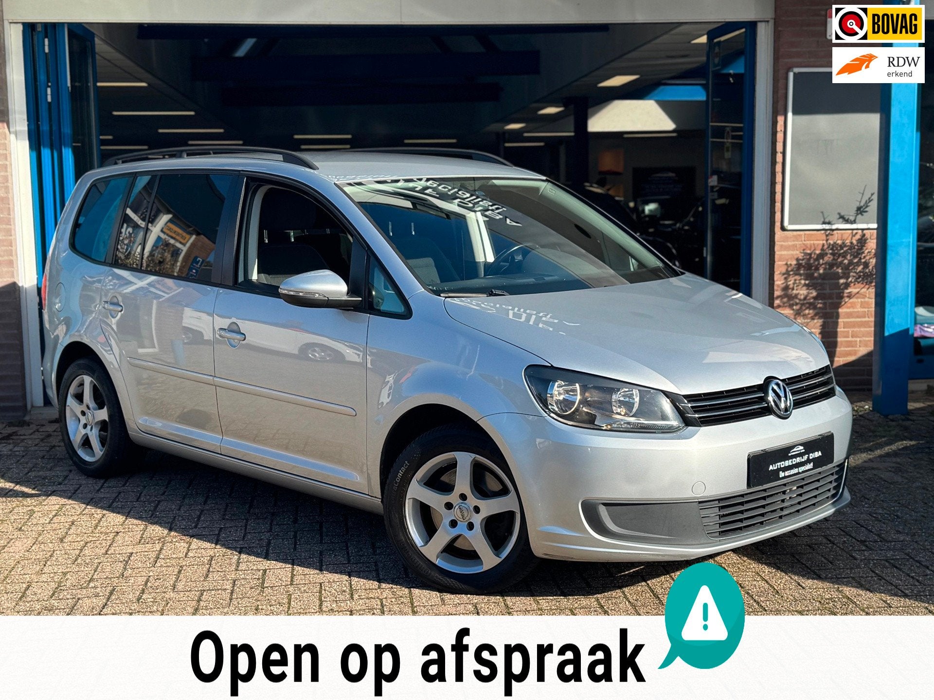 Volkswagen Touran 1.4 TSI Comfortline 7p 2013 NAVI AIRCO NAP, Auto's, Voorwielaandrijving, Gebruikt, Zwart, 4 cilinders