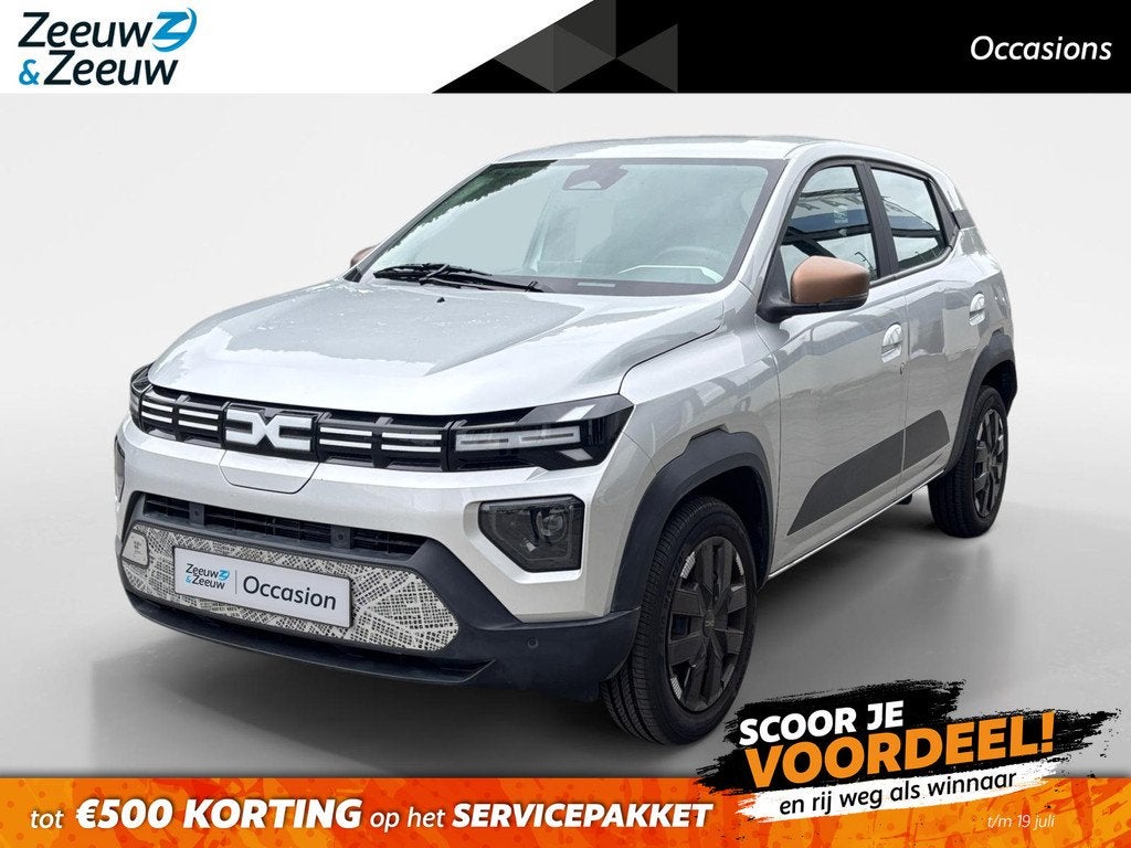 Dacia Spring Extreme 65 26.8 kWh AUTOMAAT NAVI AIRCO CAMERA, Auto's, Dacia, 12 maanden, Gebruikt, 4 stoelen, Leder en Stof