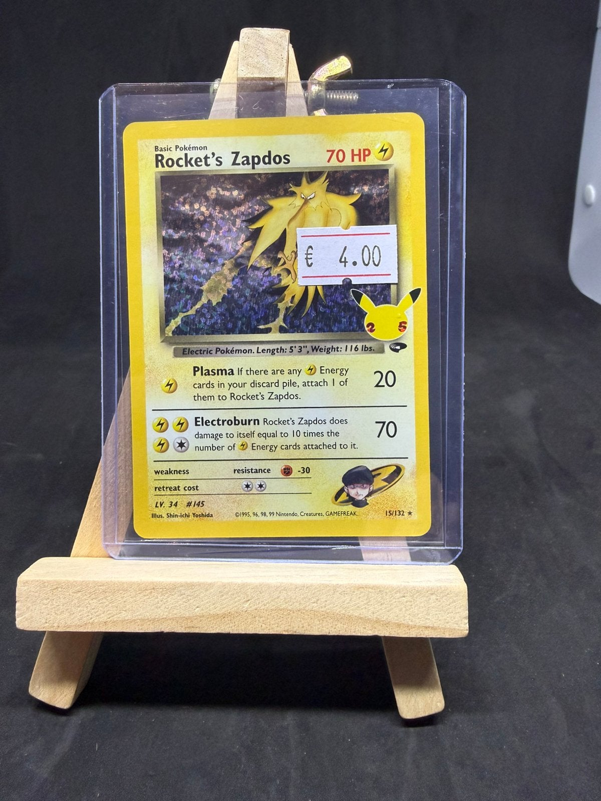 Rocket’s zapdos 15/132 celebrations nm/nm, Ophalen of Verzenden, Zo goed als nieuw