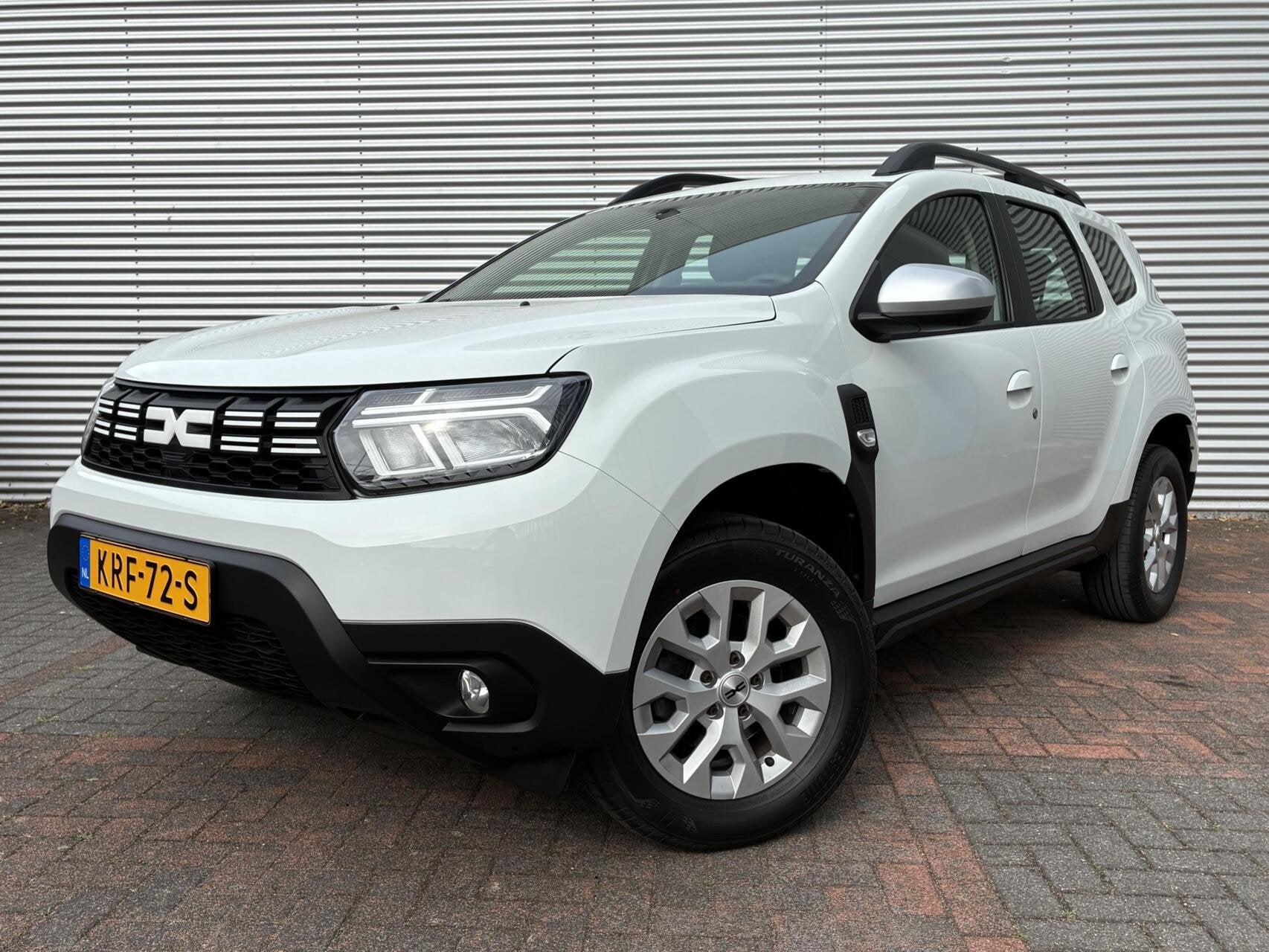 Dacia Duster 1.0 TCe Hoge Instap Airco cruise Carplay Led 23, Auto's, Voorwielaandrijving, Stof, Gebruikt, Wit