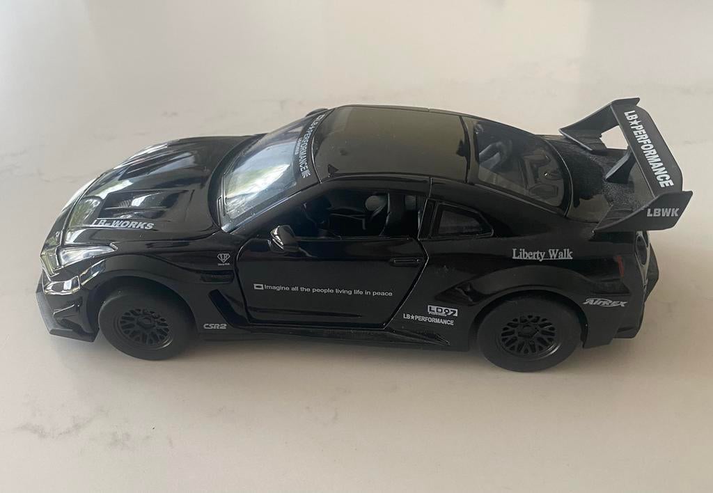 Nissan GT-R 35 1:32, Ophalen of Verzenden, Zo goed als nieuw, Auto, Overige merken
