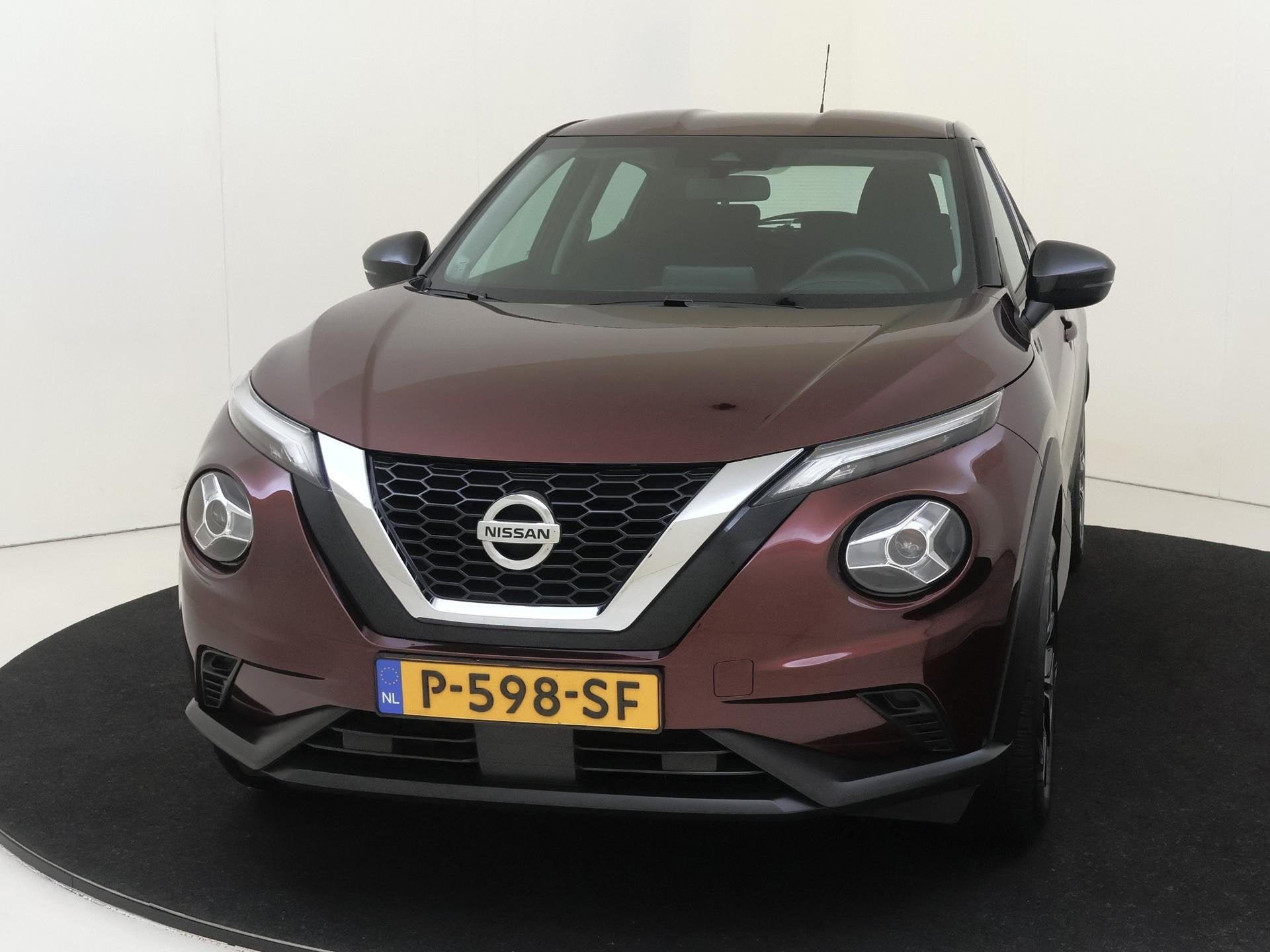 Foto 6 van Nissan Juke 1.0 DIG-T Acenta | Achteruitrijcamera | Wieldopp