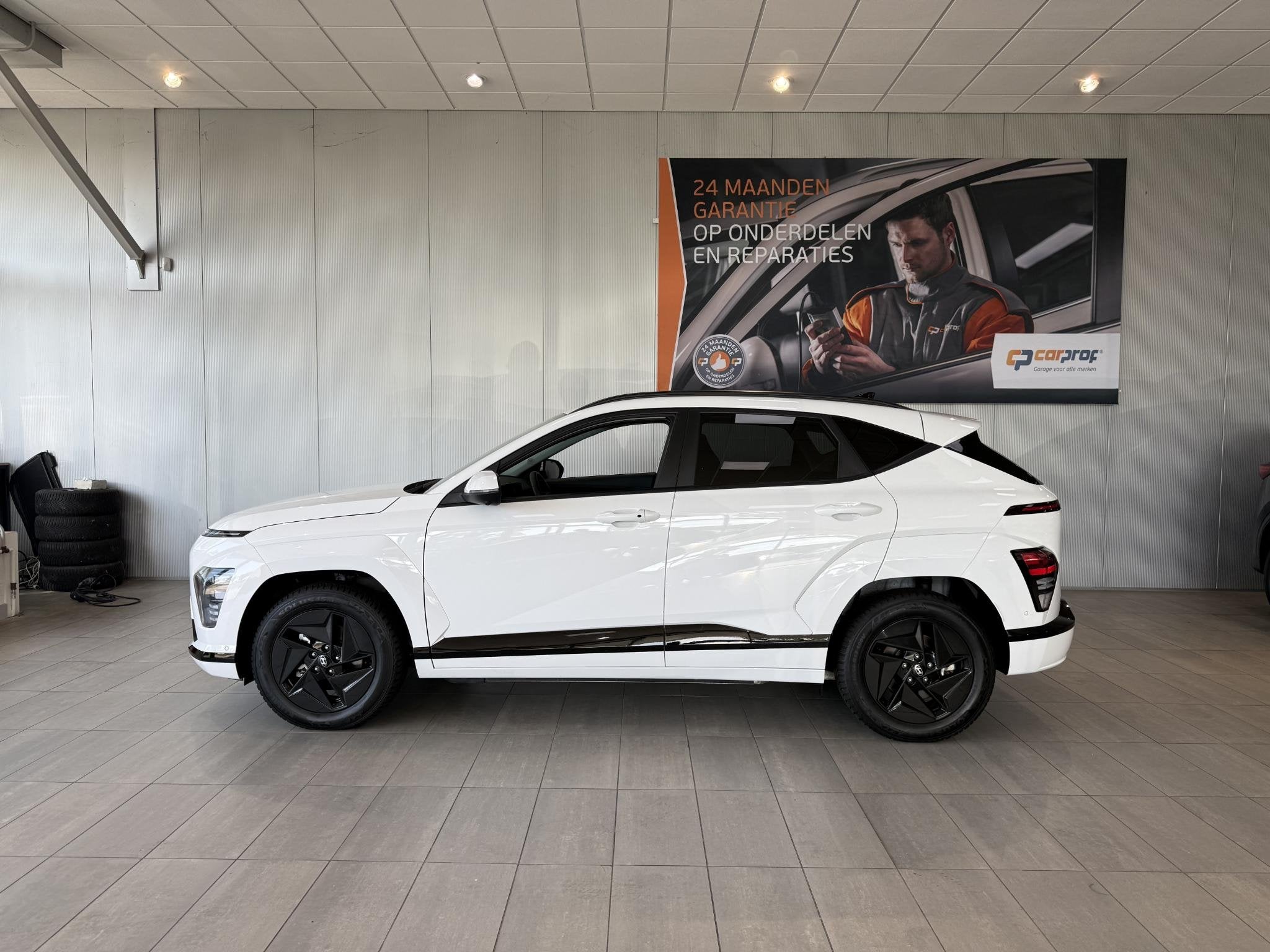 Hyundai Kona EV Fashion 64 kWh, Auto's, Stof, 750 kg, Wit, 37 min