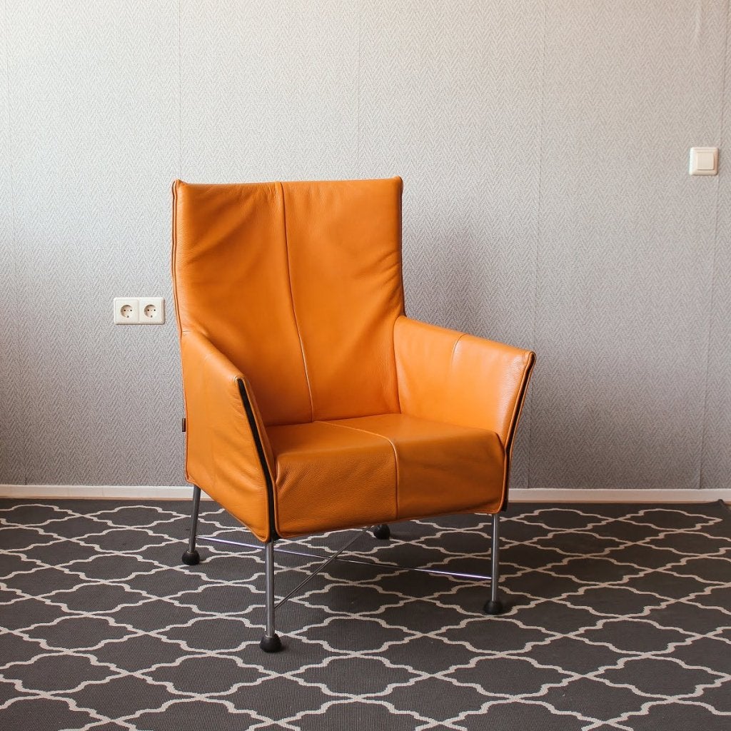 Montis Charly fauteuils; oranje leder - rvs onderstel, Niet ingevuld, Zo goed als nieuw, Niet ingevuld, Niet ingevuld