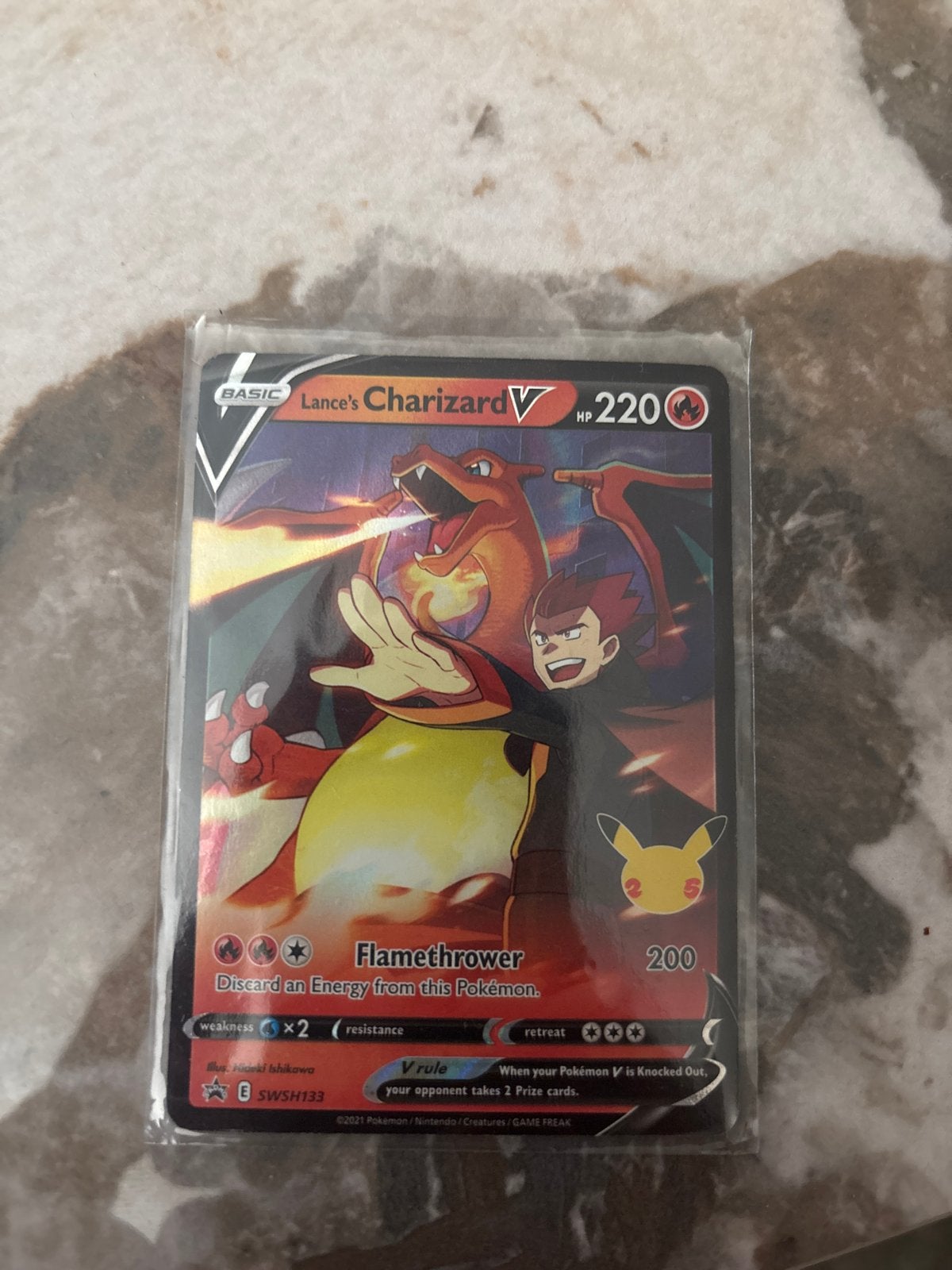 Lance's Charizard V Pokémon kaart SWSH133 Celebrations, Ophalen of Verzenden, Zo goed als nieuw, Losse kaart