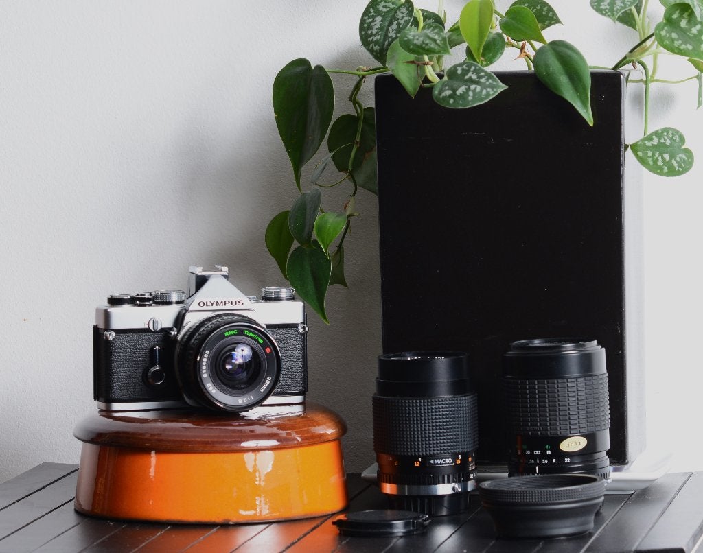 Zeer nette Olympus OM-1n met drie lenzen -, Audio, Tv en Foto, Fotocamera's Analoog, Gebruikt, Spiegelreflex, Olympus, Ophalen of Verzenden