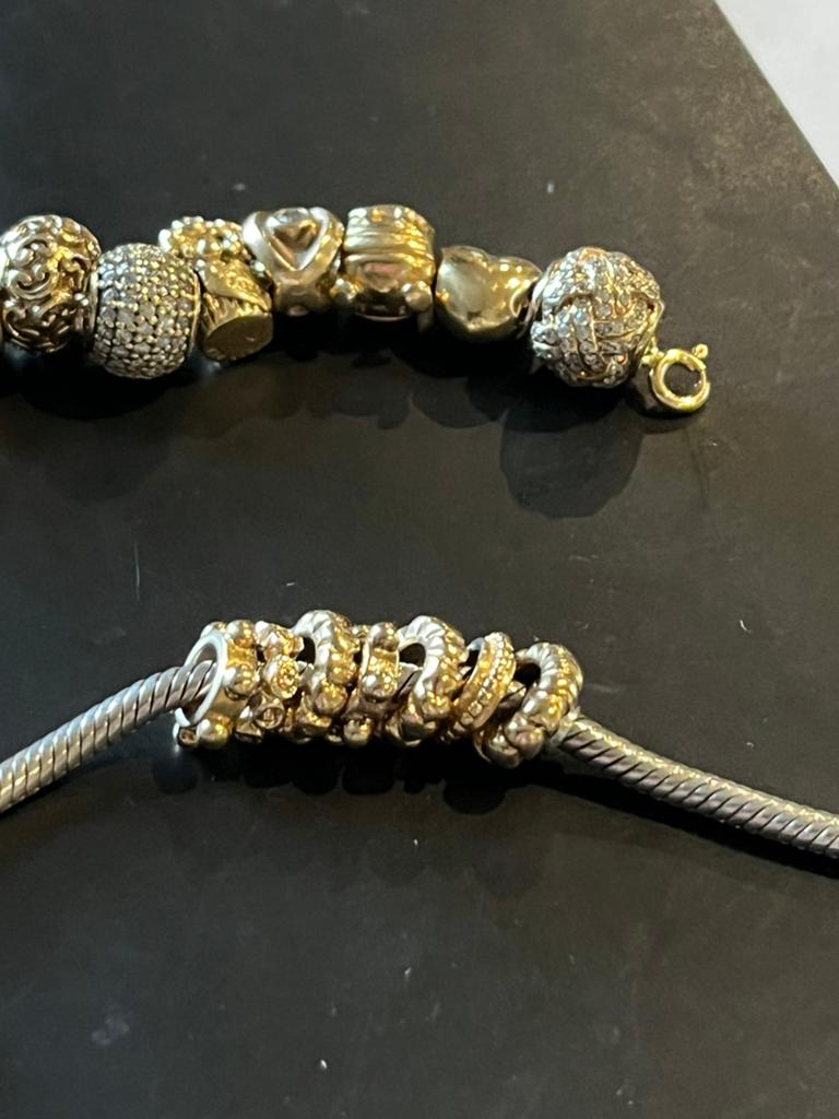 Pandora 14 krt gouden bedels vakantie  geld  tip., Sieraden, Tassen en Uiterlijk, Bedels, Ophalen of Verzenden, Zo goed als nieuw
