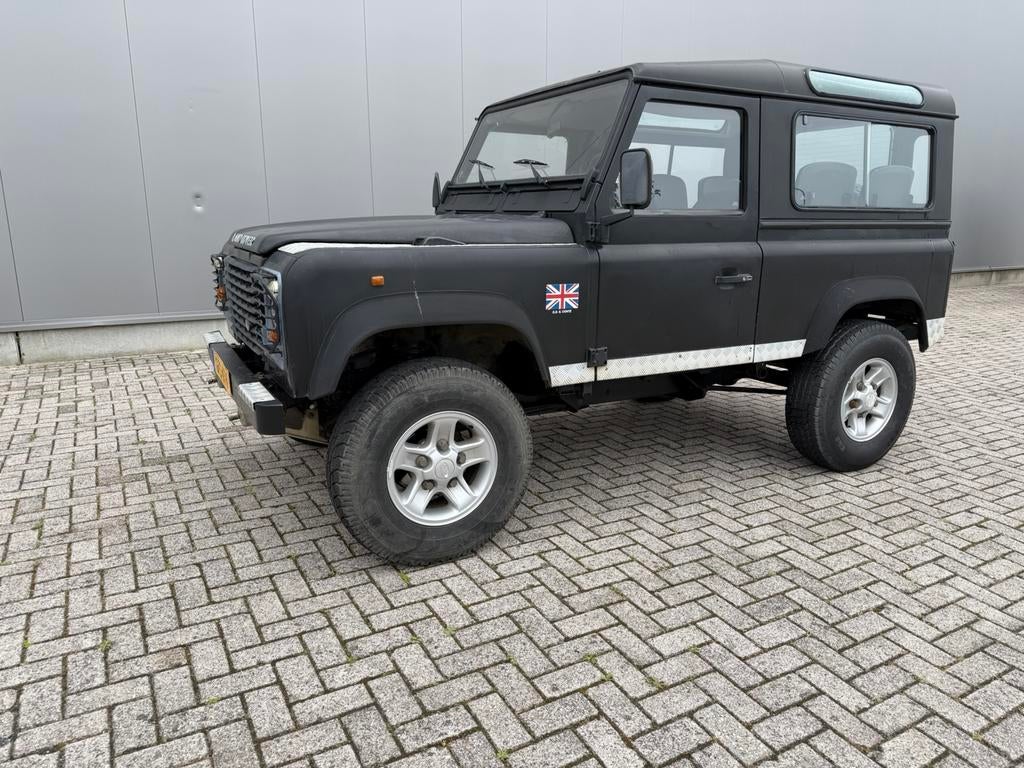 Land Rover defender 1996 2.0MPI benzine, 6 persoons, 1995 cc, Zwart, 6 stoelen, Geïmporteerd