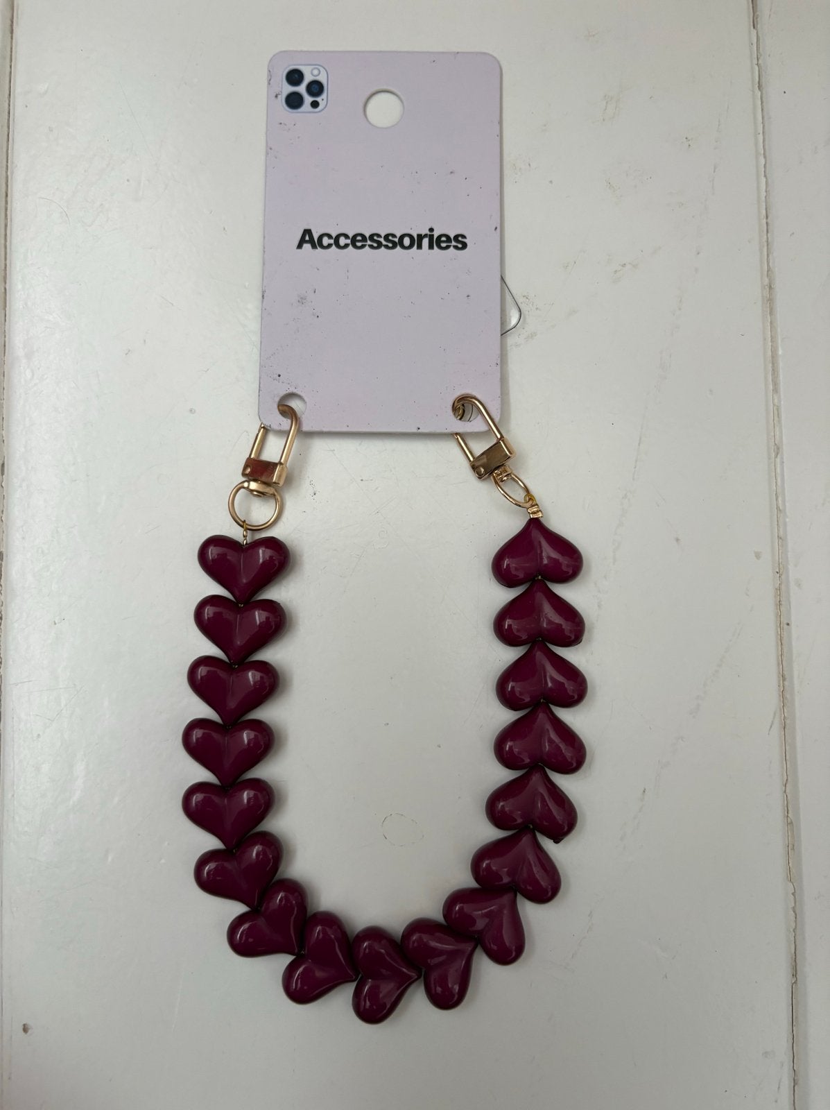 Telefoon ketting koord met donker paarse hartjes, Telecommunicatie, Ophalen of Verzenden, Nieuw, Telefoonhanger of Accessoire