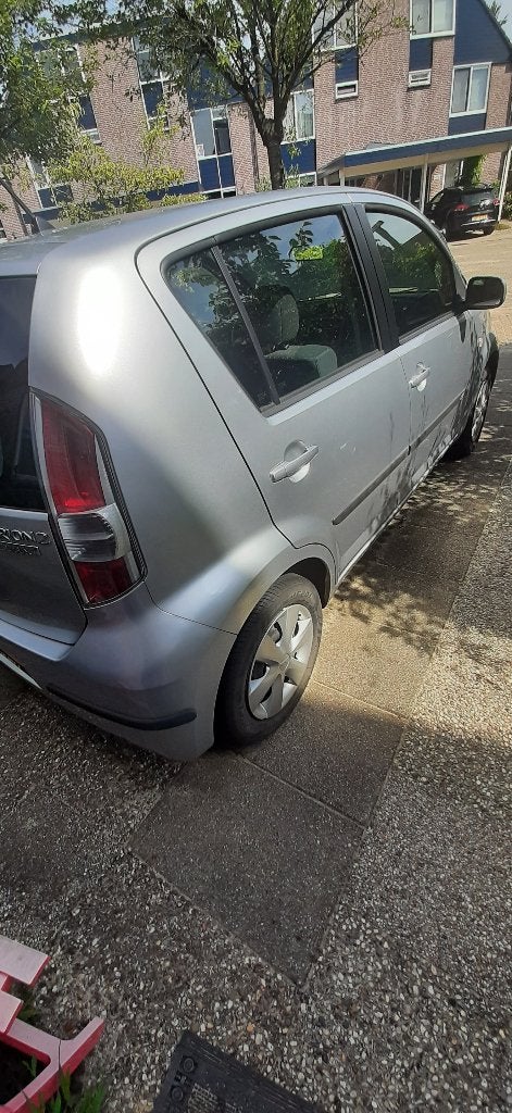 Daihatsu Sirion 1.3 AUT 2008 Grijs  88740km, Auto's, Daihatsu, Stof, 31 €/maand, 4 cilinders, Grijs