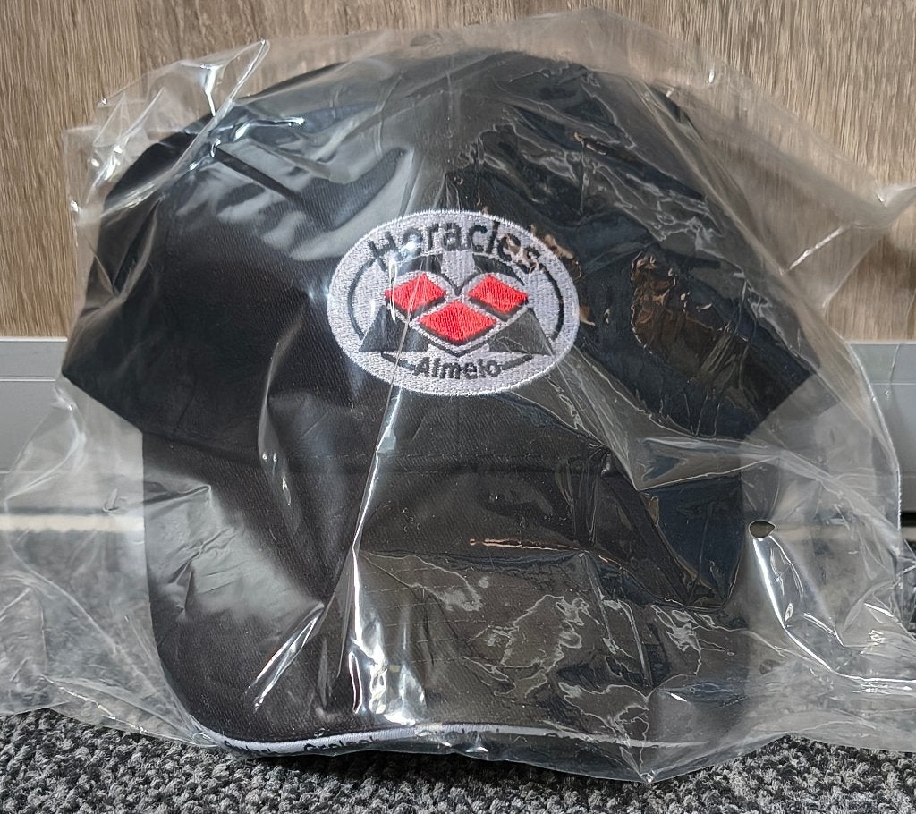 Heracles Almelo pet (Grolsch), Ophalen of Verzenden, Nieuw, Overige binnenlandse clubs, Pet of Muts