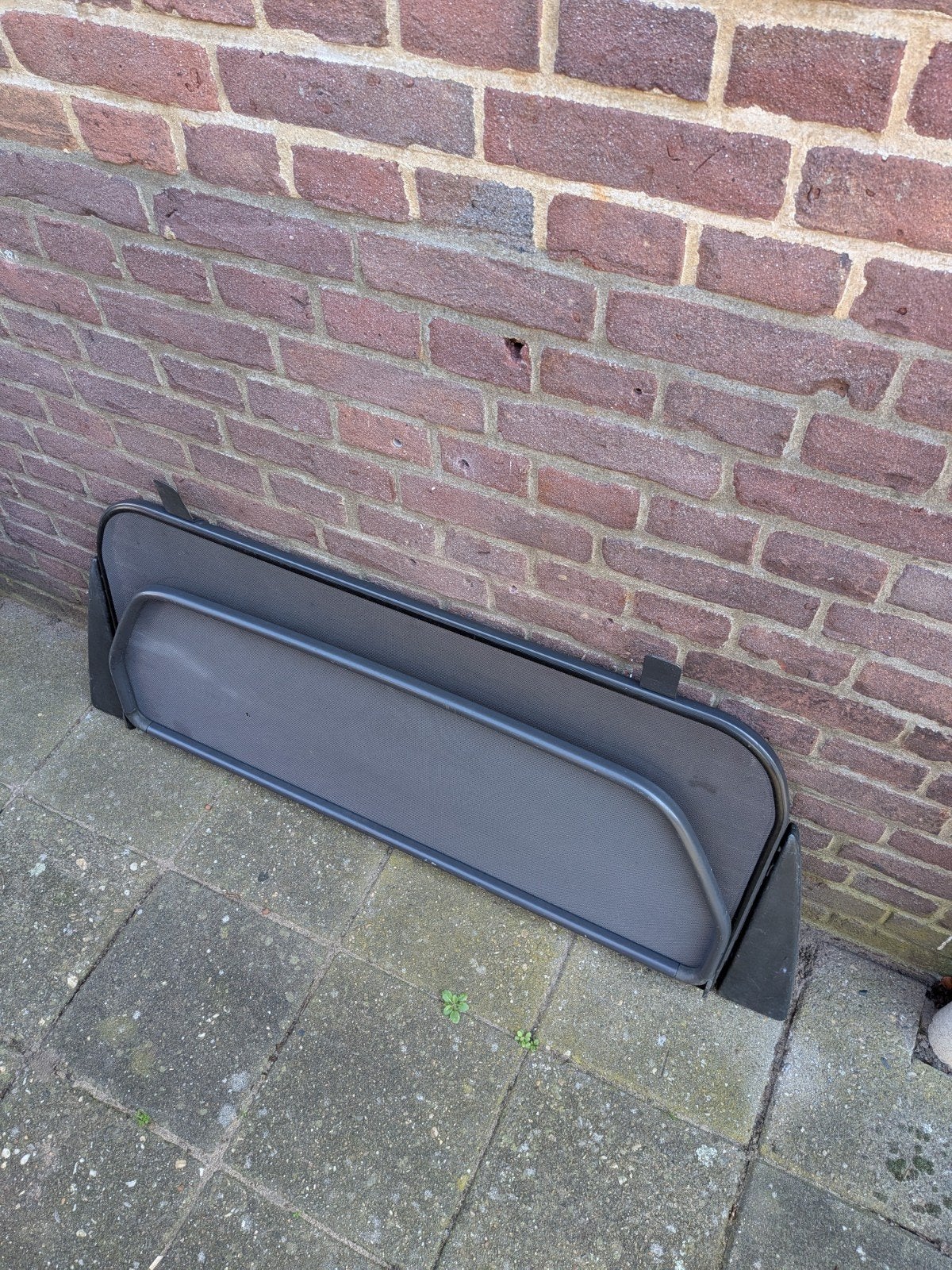 Windscherm Volvo C70, Ophalen