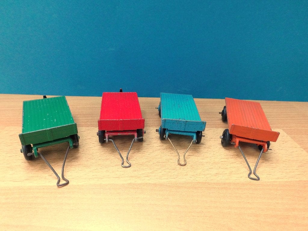 Dinky Toys # 25g/429 4 verschillende platte aanhangertjes, Ophalen of Verzenden, Gebruikt, Overige typen, Dinky Toys
