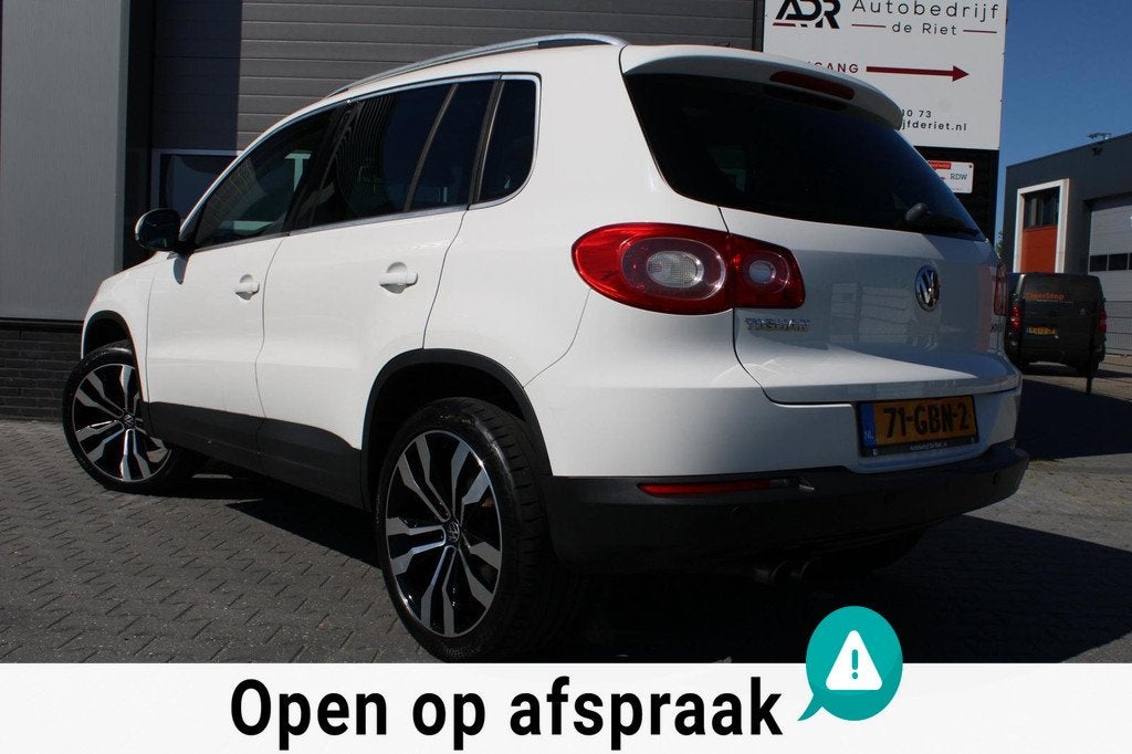 Volkswagen Tiguan 2.0 TSI DSG 4Motion|PANO|LEDER|CAMERA|PDC, Auto's, Automaat, Gebruikt, 1984 cc, Wit
