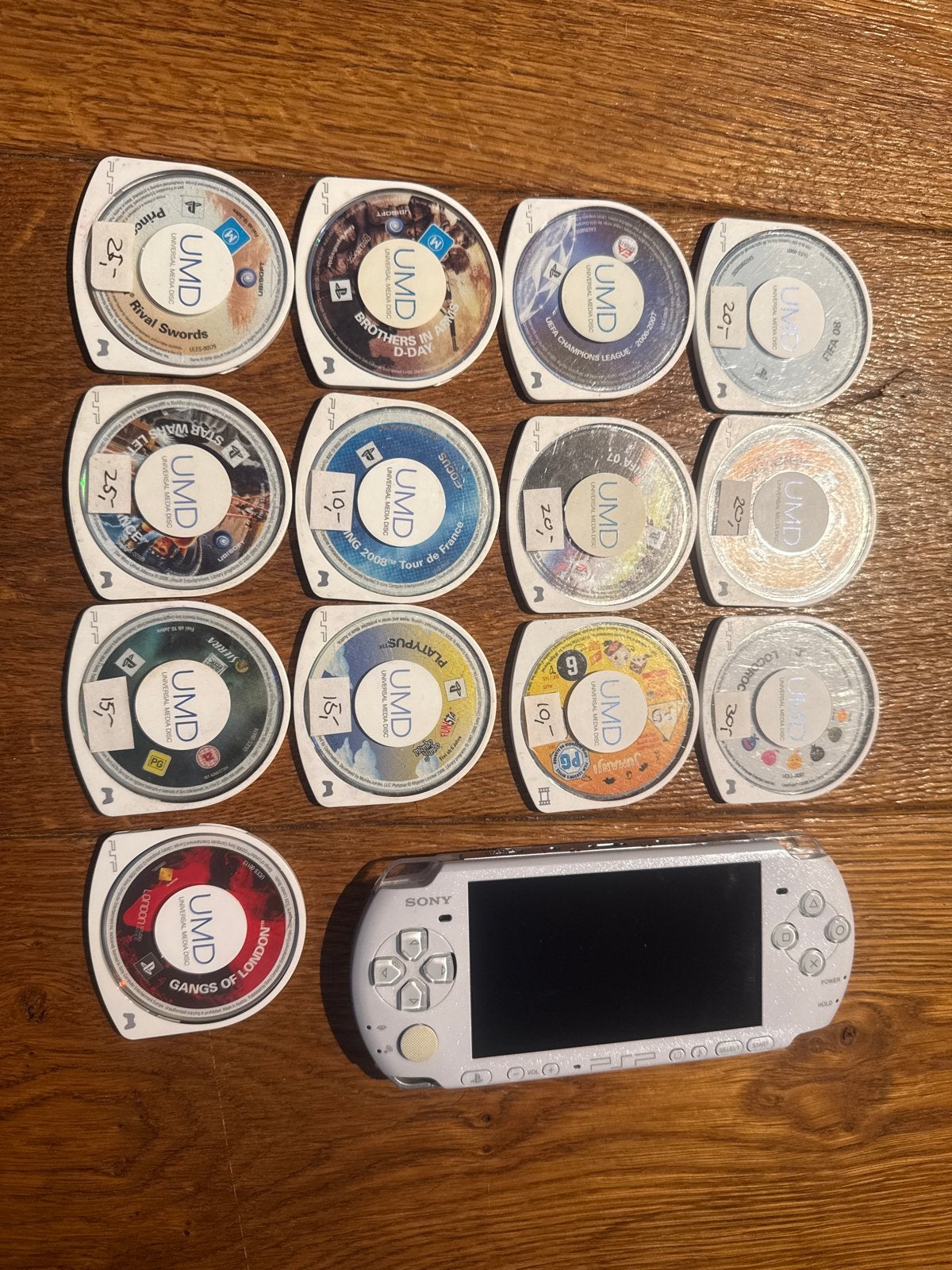 Sony PSP met 13 UMD games - Wit, Spelcomputers en Games, Games | Sony PlayStation Portable, Gebruikt, Overige genres, 1 speler