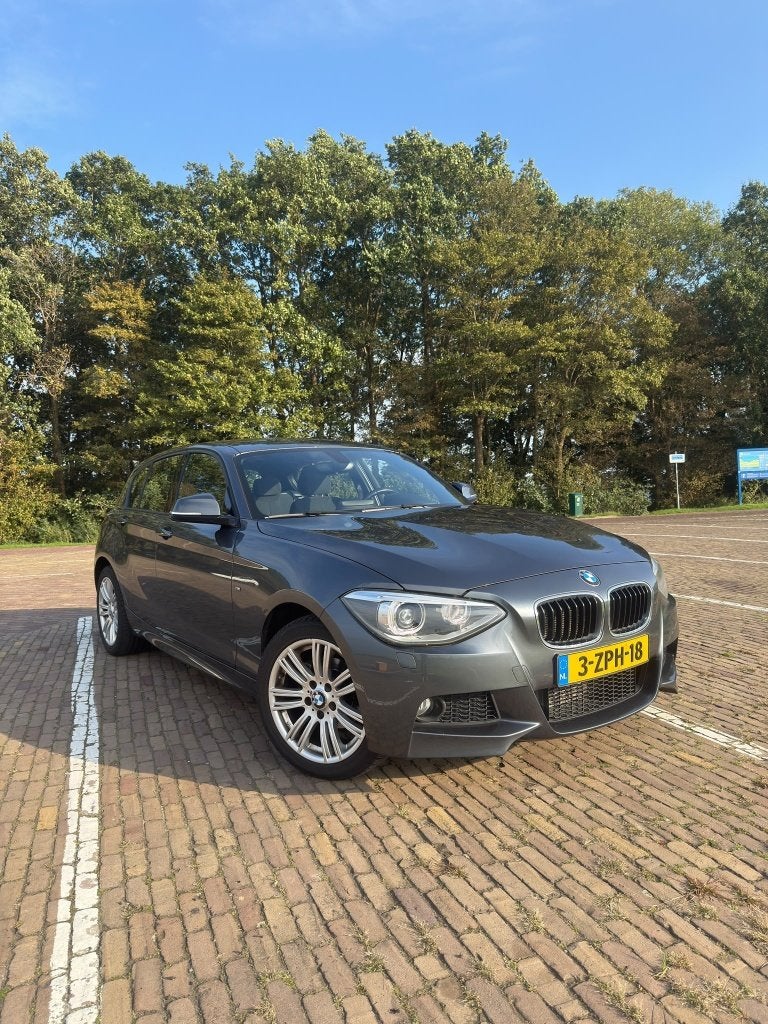 BMW 116i M Sport Automaat, 136 pk, dealeronderhouden, 1-Serie, 4 cilinders, Navigatiesysteem, Leder en Stof