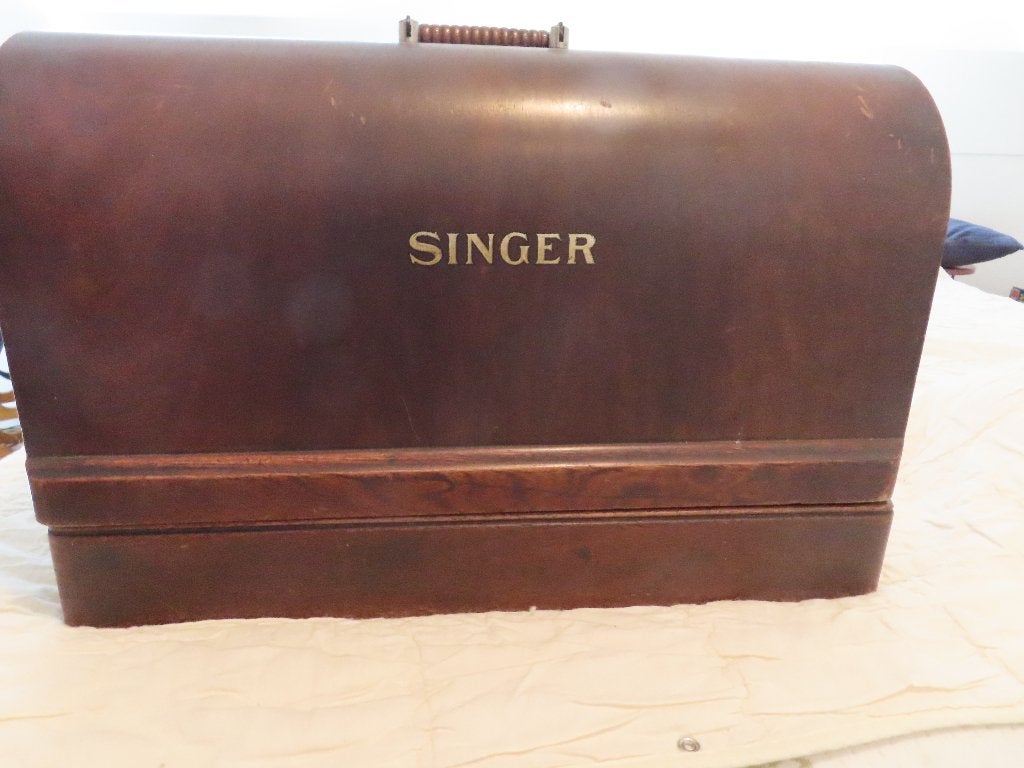 Te koop Singer handslingernaaimachine., Ophalen