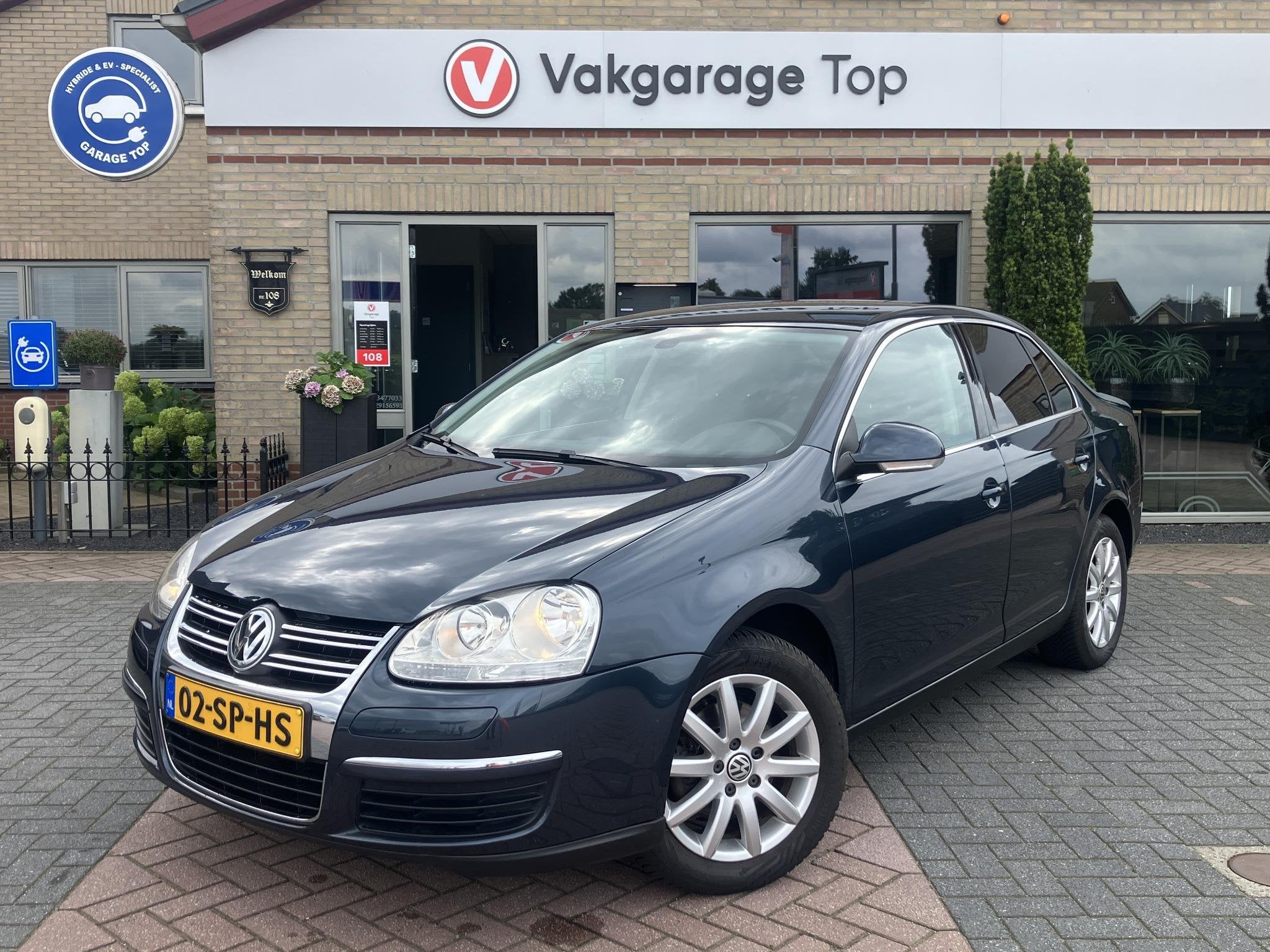 Volkswagen Jetta 2.0 FSI Comfortline | Trekhaak | PDC | Navi, Auto's, Gebruikt, Zwart, 4 cilinders, Origineel Nederlands