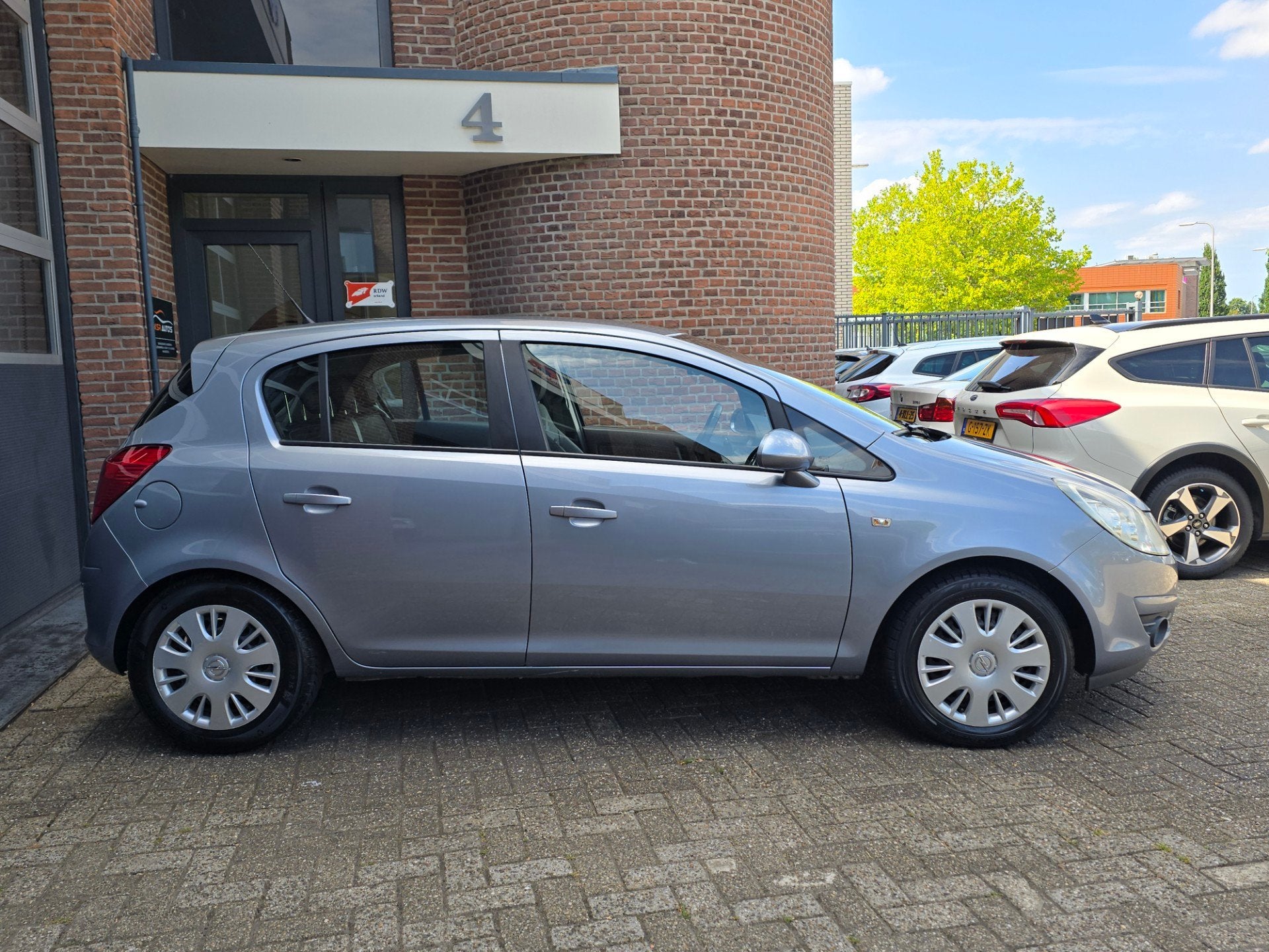 Opel Corsa 1.4-16V Cosmo Airco |Fietsendrager |Nap, Auto's, Opel, Voorwielaandrijving, 1063 kg, Gebruikt, Stuurwielverwarming