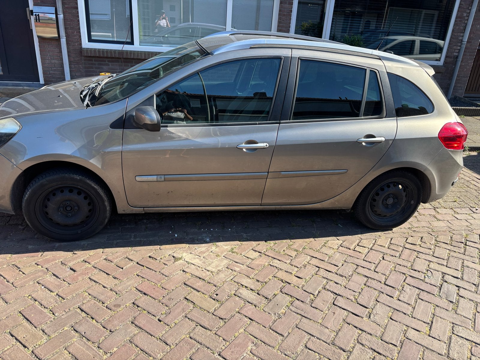 Renault Clio 1.2 16V 55KW Estate 2012 Bruin, Auto's, Voorwielaandrijving, 535 kg, 74 pk, 4 cilinders
