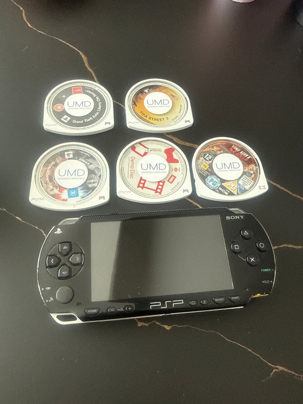 Sony PSP met 5 UMD games en 1 demo disc, Spelcomputers en Games, Ophalen, Gebruikt, Overige genres, 1 speler