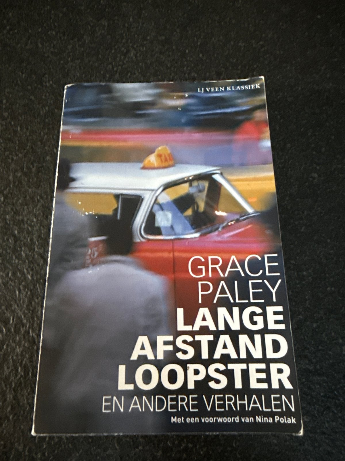 Grace Paley - Langeafstandloopster en andere verhalen, Boeken, Grace Paley, Ophalen of Verzenden, Zo goed als nieuw, Amerika