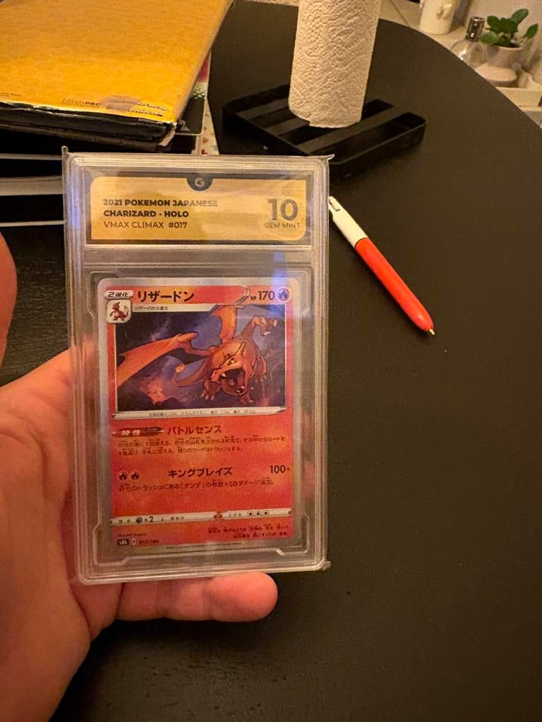 Charizard climax grade 10, Ophalen of Verzenden, Zo goed als nieuw, Meerdere kaarten, Foil