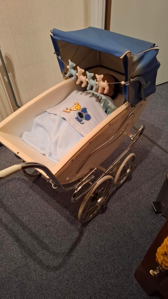 Poppenwagen ouderwets, Ophalen, Babypop