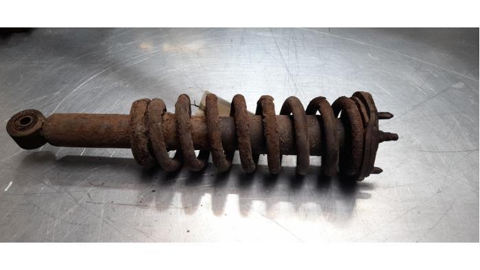 Schokdemper links-voor van een Toyota Landcruiser, Auto-onderdelen, Ophanging en Onderstel, Toyota, Gebruikt, 3 maanden garantie